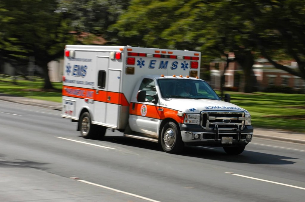 A Type 1 ambulance shows how fast it can go on surface streets. 