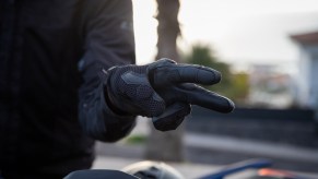A motorcyclist wave is a hand signal for friendly recognition of another rider.