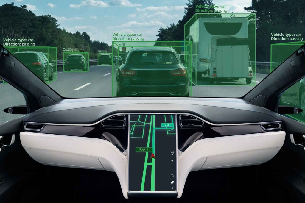 A rendering of the driver's view of a fully self-driving car no steering wheel green light boxes around other cars on road