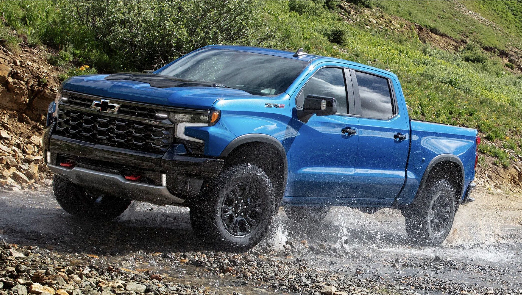 The 2024 Chevy Silverado 1500 fording a stream
