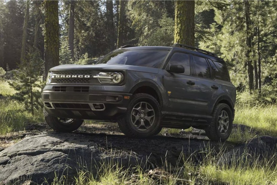 The 2024 Ford Bronco Sport off-roading in the woods