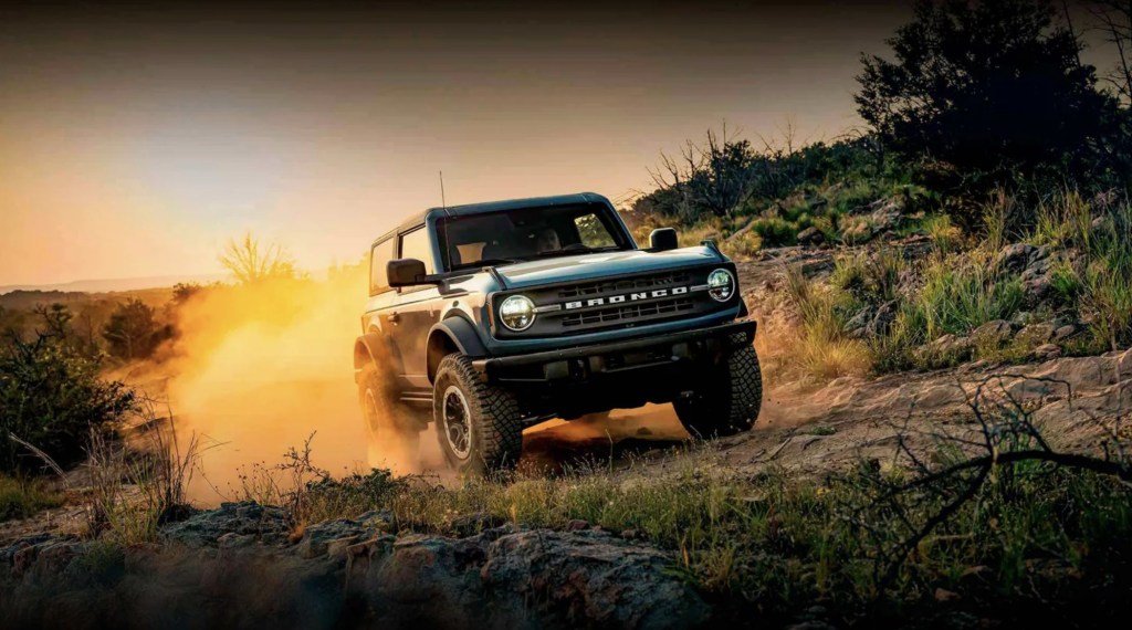 The 2024 Ford Bronco off-roading at dusk