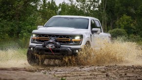 The 2024 Ford F-150 kicking up mud