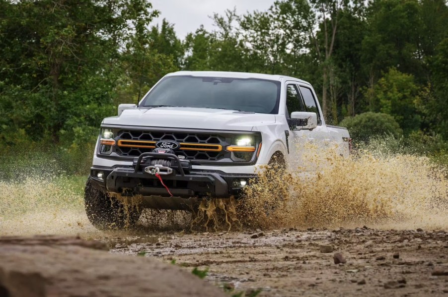 The 2024 Ford F-150 kicking up mud