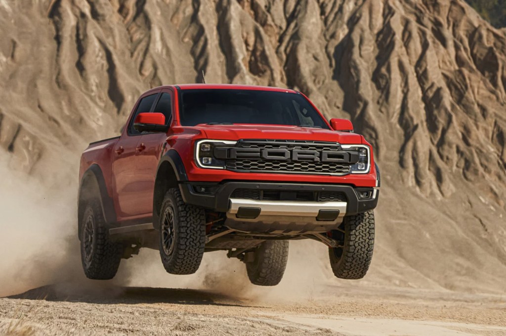 The 2024 Ford Ranger Raptor jumping in the desert