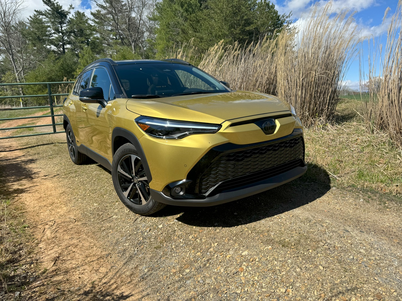 The 2024 Toyota Corolla Cross Hybrid in a rural setting 