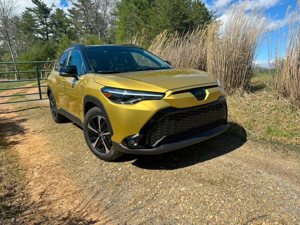 The 2024 Toyota Corolla Cross Hybrid in a rural setting