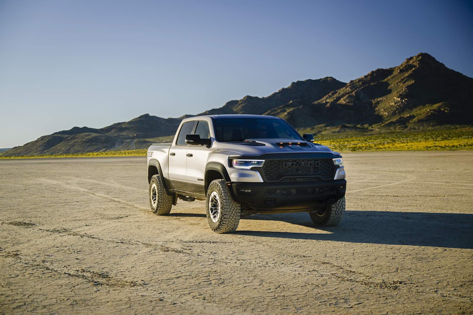 Silver Ram truck parked off road