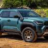 2025 Toyota 4Runner Trailhunter posed on a dirt trail.