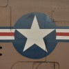 The Air Force's star insignia on the aluminum side of a plane.