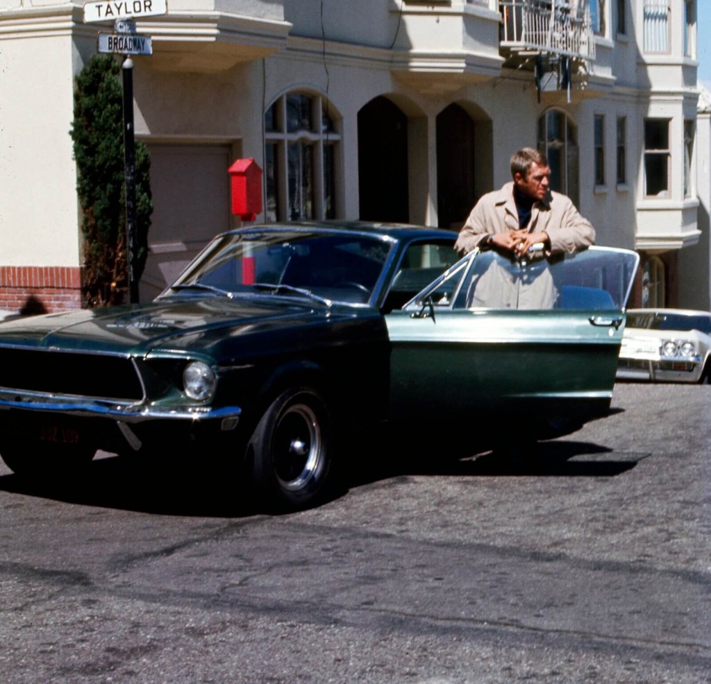 Steve McQueen along with one of the most famous Ford Mustang ever to appear in movies, the 'Bullitt' GT 390. 