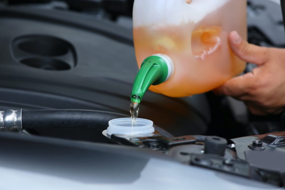 Coolant being added to a car