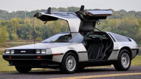 DeLorean DMC-12 posed with the gullwing doors open.