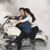Pierce Brosnan and Michelle Yeoh on a BMW R1200C from the James Bond film 'Tomorrow Never Dies'.