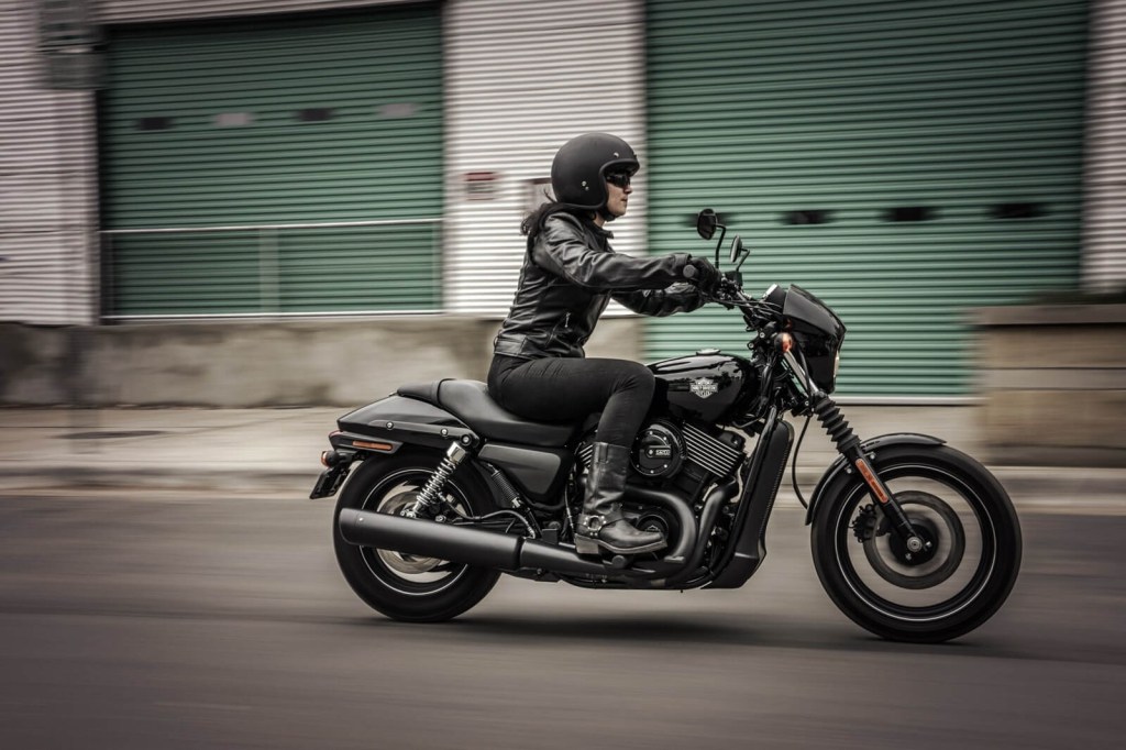 A person rides a Harley-Davidson Street 750, on of the movie motorcycles in the Marvel Cinematic Universe.