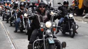 Group of bikers from multiple outlaw motorcycle clubs ride in a protest together