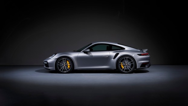 A silver Porsche 911 Turbo S from the side.