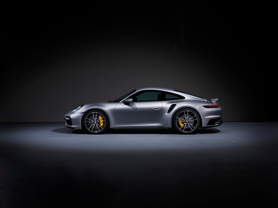 A silver Porsche 911 Turbo S from the side.