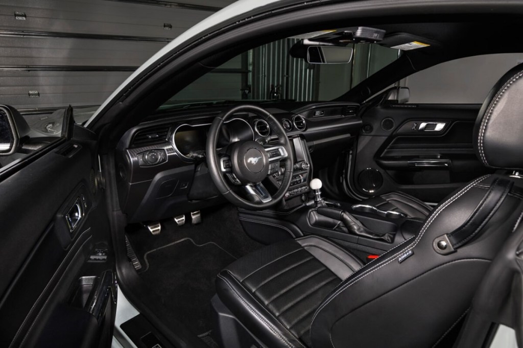 A now-discontinued manual Ford Mustang Mach 1 shows off its interior and cue ball shifter. 