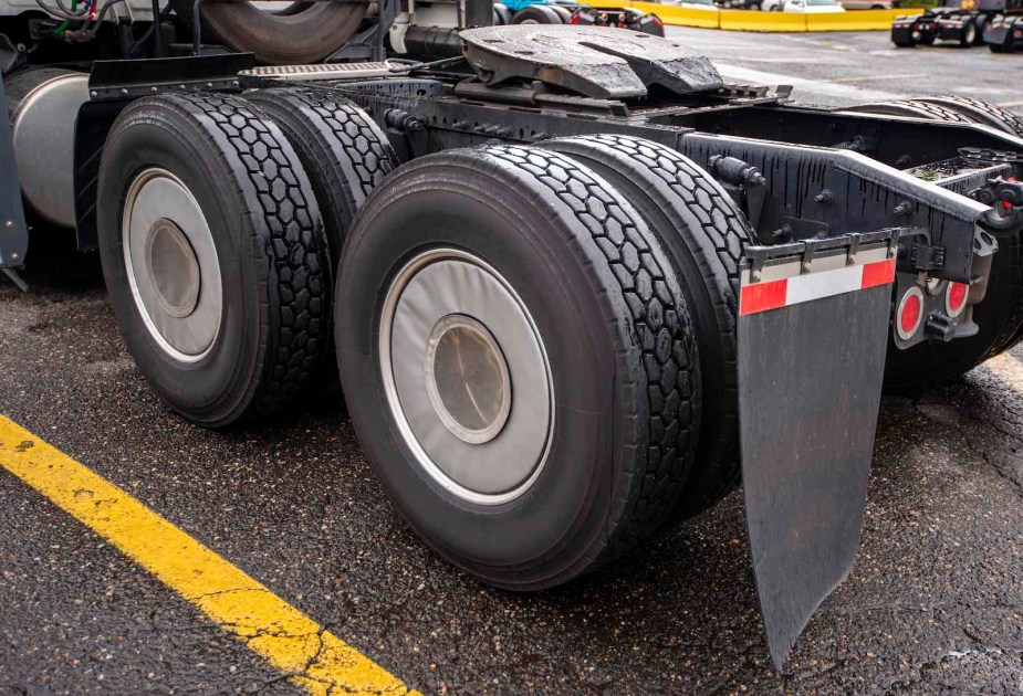 Blank rubber mudflaps on a semi truck