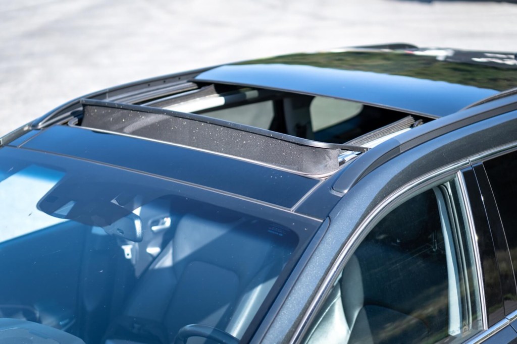 A car shows off its open sunroof which could be a disadvantage with greater weight and water resistance issues. 