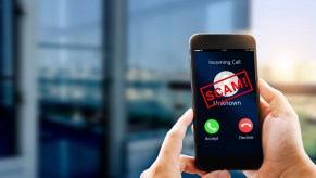 Cellphone displaying a telemarketing scam call.