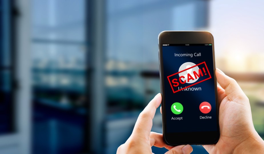 Cellphone displaying a telemarketing scam call.