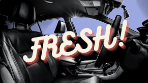 A black leather car interior shown in high contrast blue background word "FRESH!" overlaying in fluorescent font