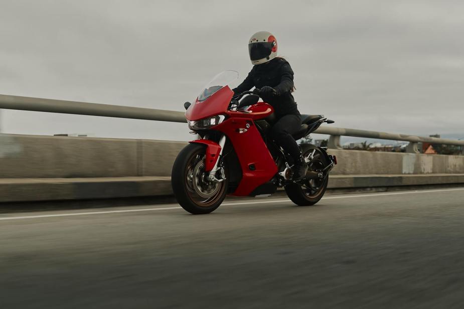 A rider cruises on a Zero SR/S electric motorcycle.