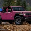 The 2024 Jeep Gladiator parked near a river