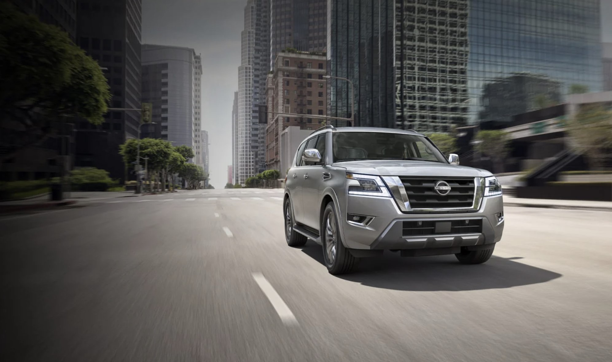 The 2024 Nissan Armada driving in the city 