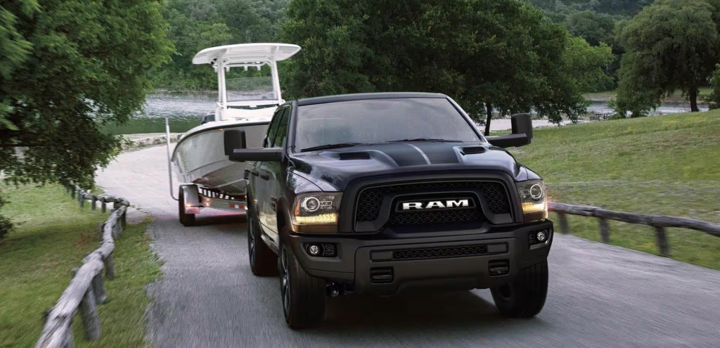 The 2024 Ram 1500 Classic pulling a boat