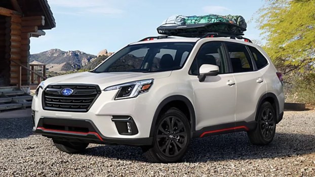 the 2024 Subaru Forester parked in gravel
