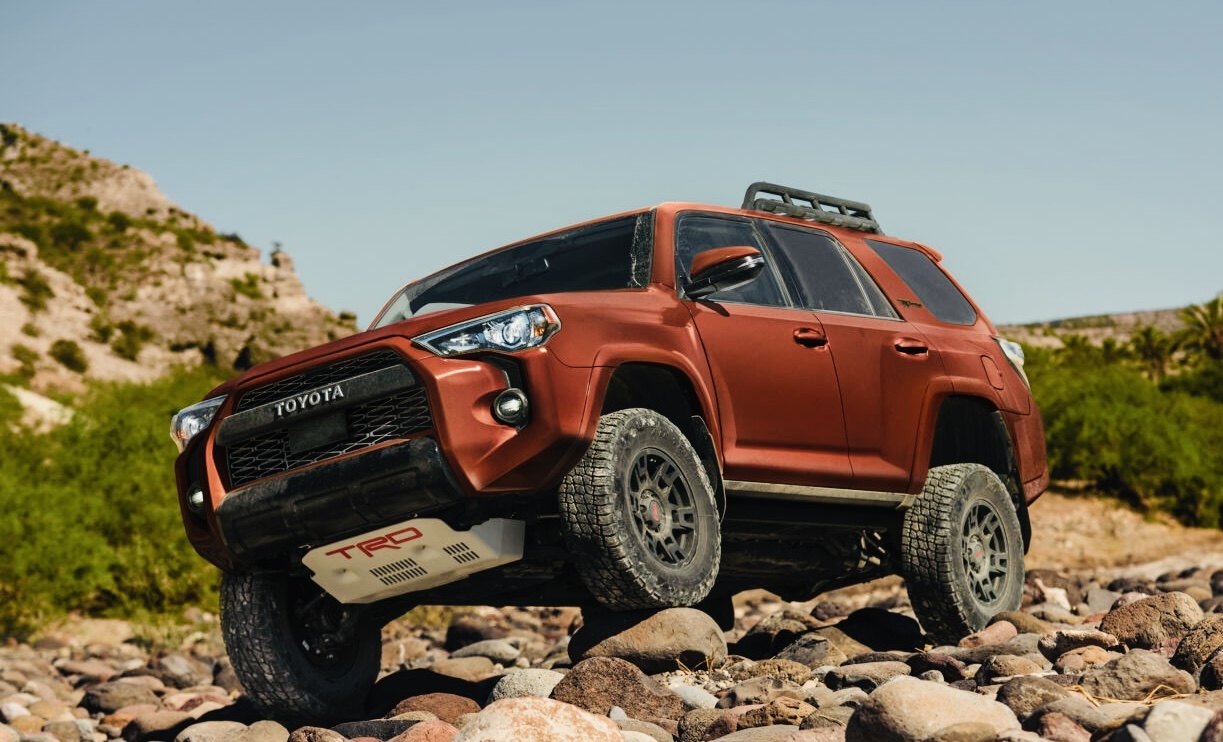 The 2024 Toyota 4Runner climbing over rocks