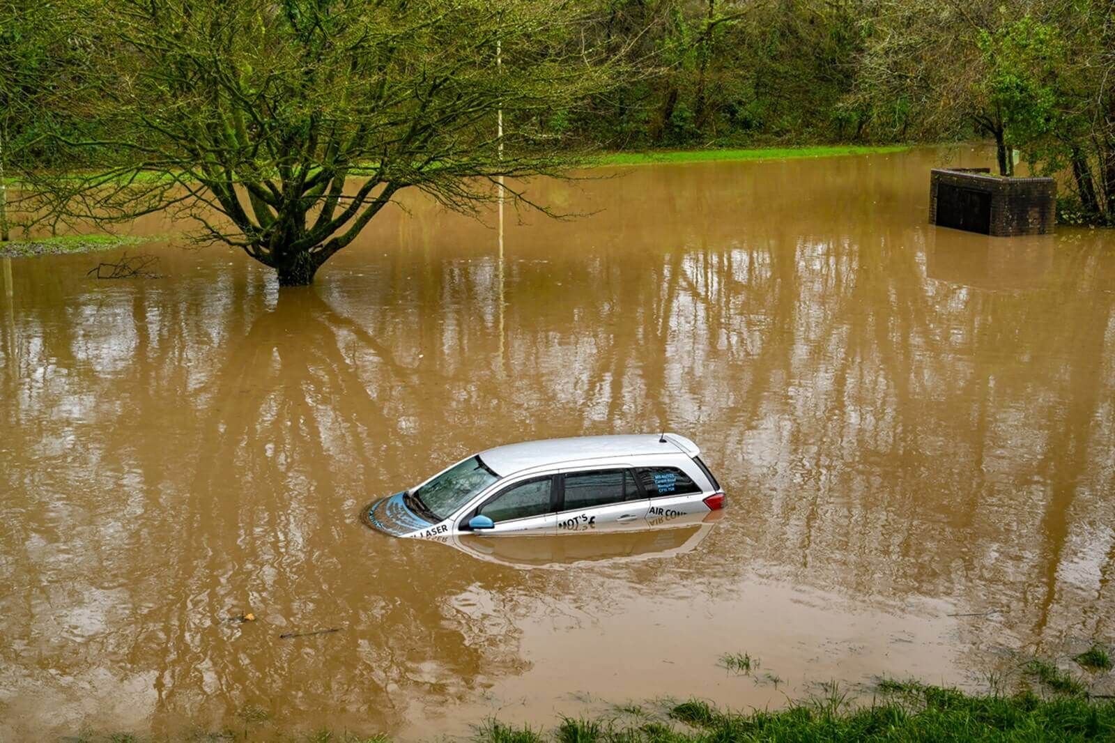 A hatchback van submerged in flood waters could be an act of God insurance claim. 