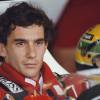 Formula 1 driver Ayrton Senna sits in his race car before a Grand Prix