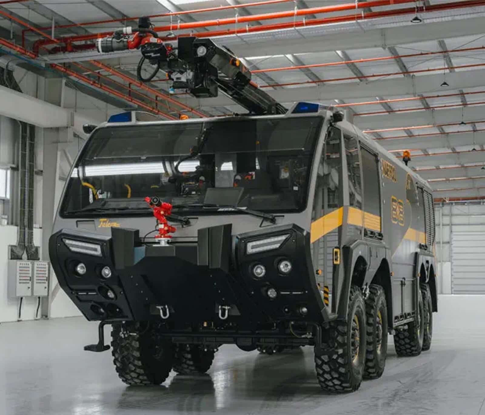 The Falcon 8x8 airport fire truck looks like a real version of a fancy toy fire truck. 