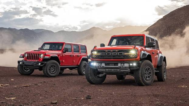 Ford Bronco Raptor and Jeep Wrangler Rubicon 392 battle it out on the trails.
