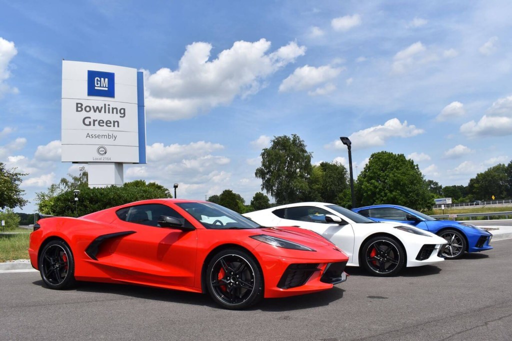 Three Chevrolet Corvettes park next to the GM Bowling Green sign in Kentucky, the home state of the Kentucky Derby.