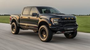 A black Hennessey VelociRaptoR 1000 drives on a test track as the company's latest 'Super Truck'.