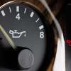 A low oil pressure gauge in a car's dashboard