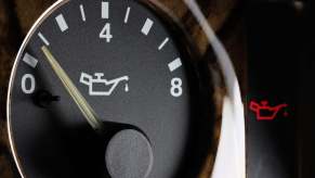 A low oil pressure gauge in a car's dashboard