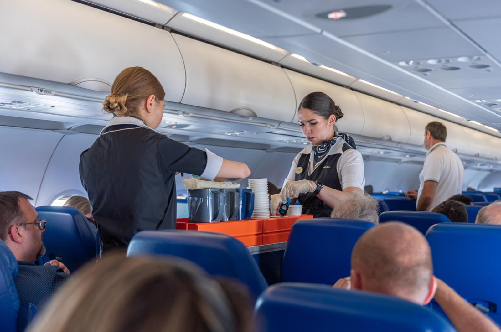 A set of flight attendants, dictated by how many passengers are on the flight, serve passengers. 