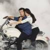 Pierce Brosnan and Michelle Yeoh on a BMW R1200C motorcycle from the James Bond film 'Tomorrow Never Dies'.