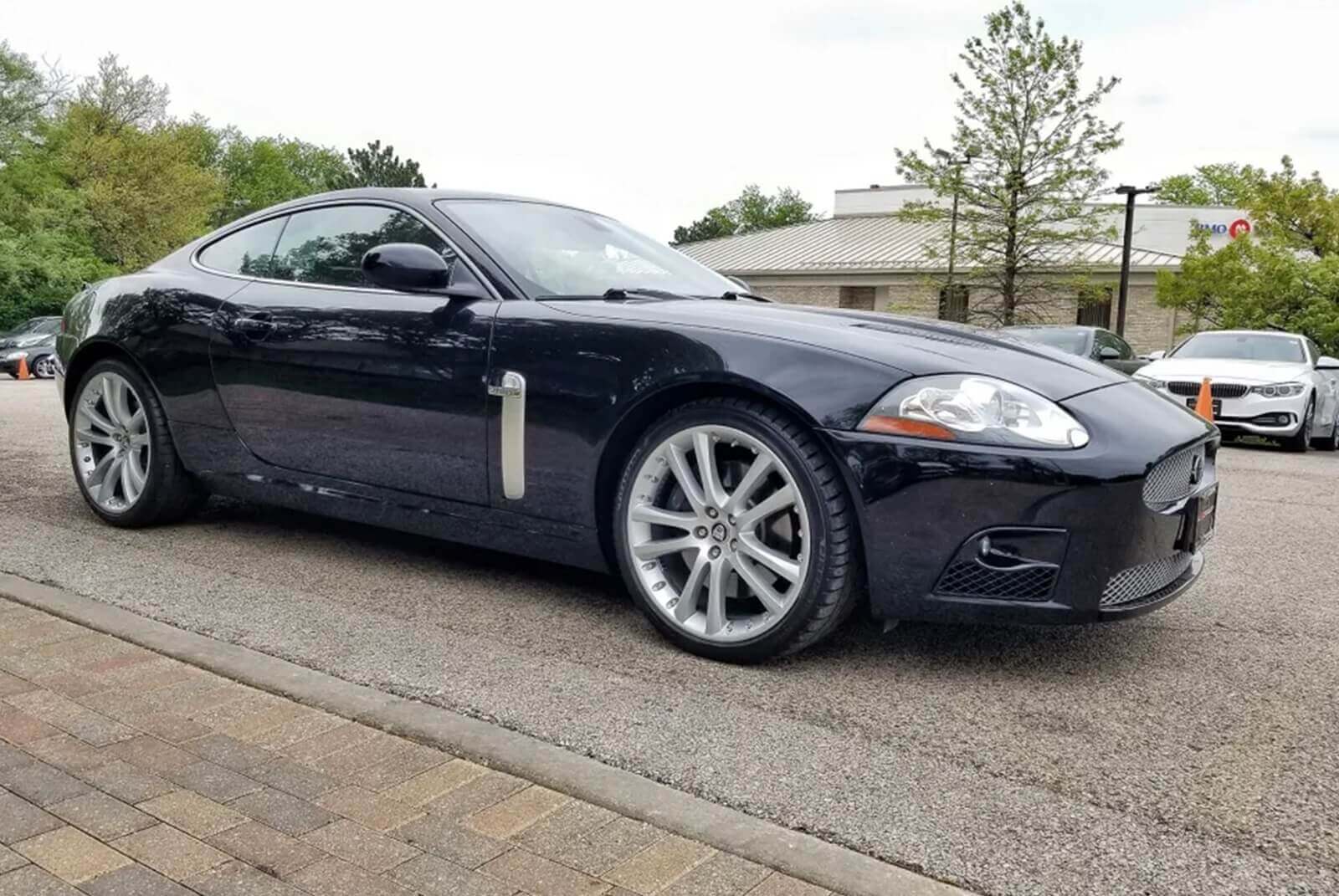 A 2007 Jaguar XKR sits outside before a pre-purchase inspection. 