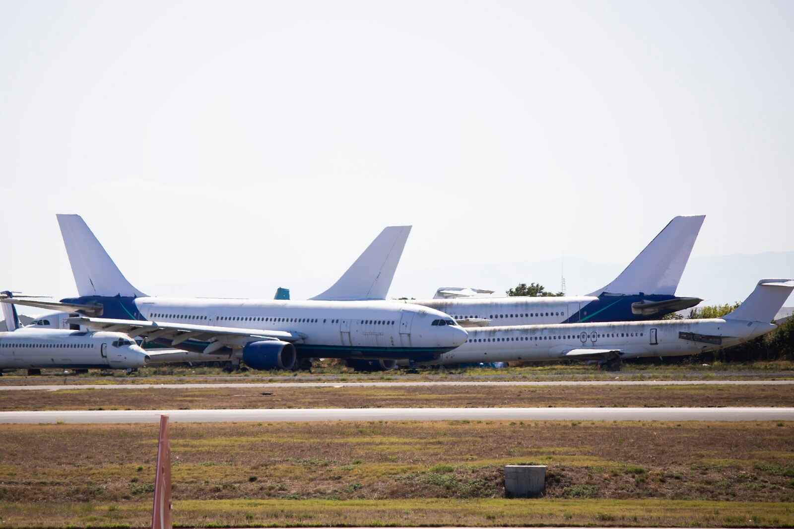 Scrapped airplanes sitting in a bone yard