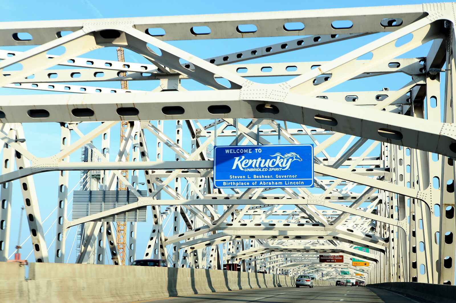 A close view of the "Welcome to Kentucky" sign on the George Rogers Clark Memorial Bridge
