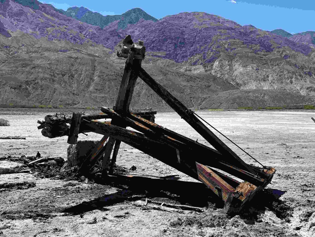 The damaged Salt Tram Tower #1, toppled over from what appears to be a winch used to haul a stuck vehicle