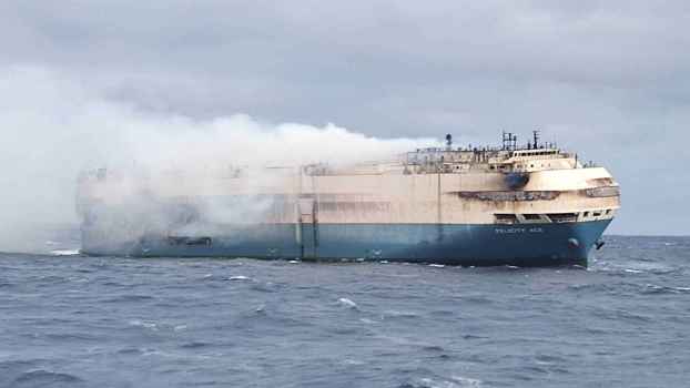 The Felicity Ace cargo ship on fire in the Atlantic Ocean