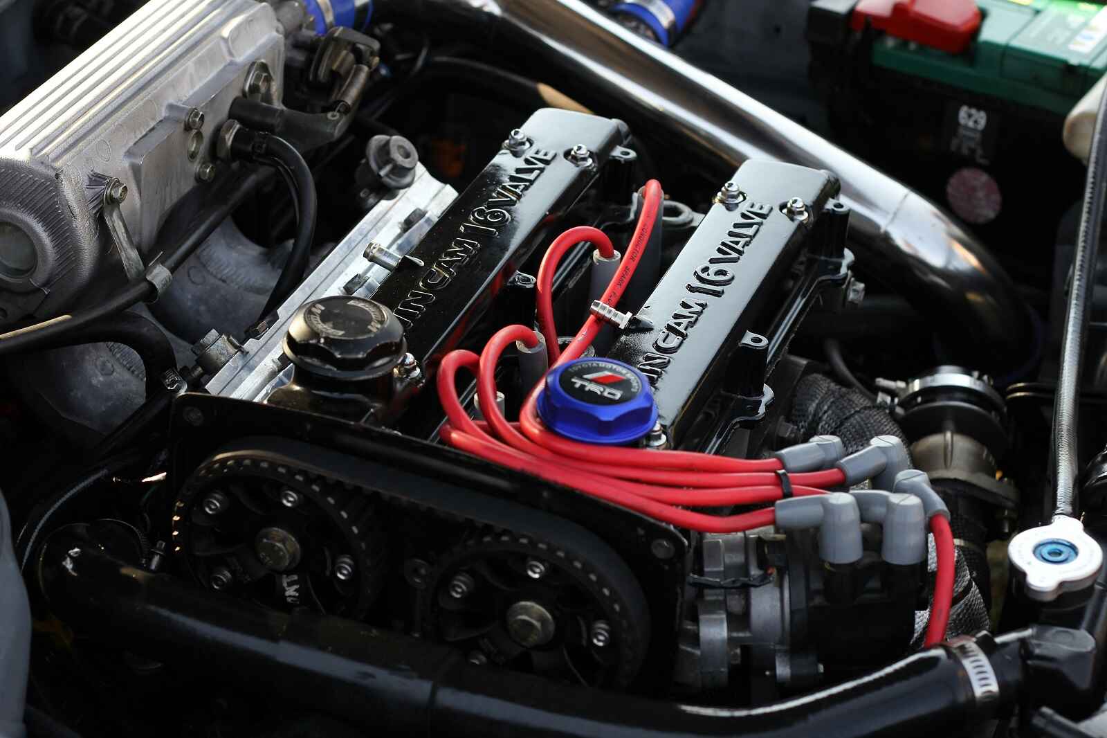 A Toyota TRD V8 engine shown with timing belt exposed on the side